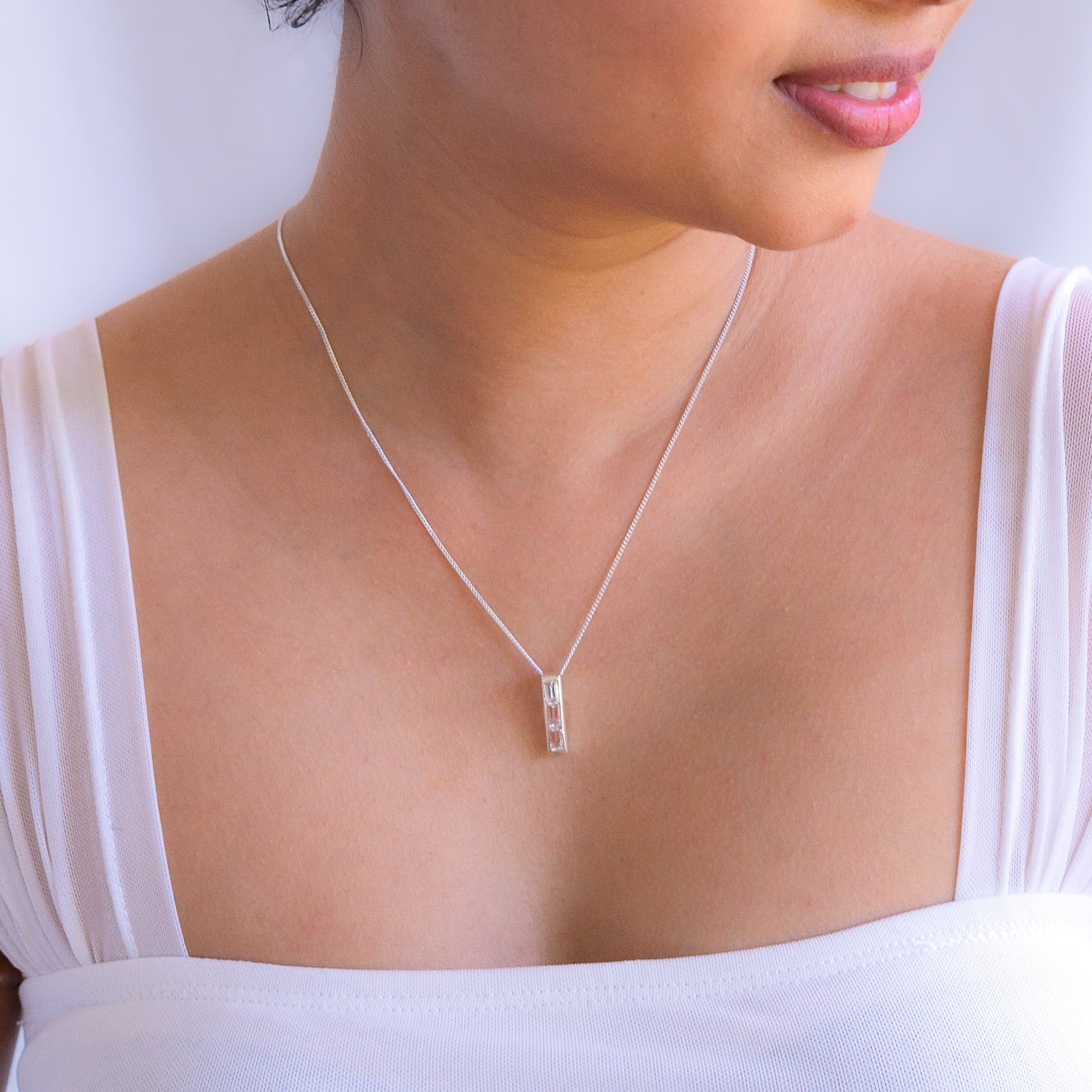 Sterling silver Arabella necklace with white topaz gemstone pendant by Cherie Lueur