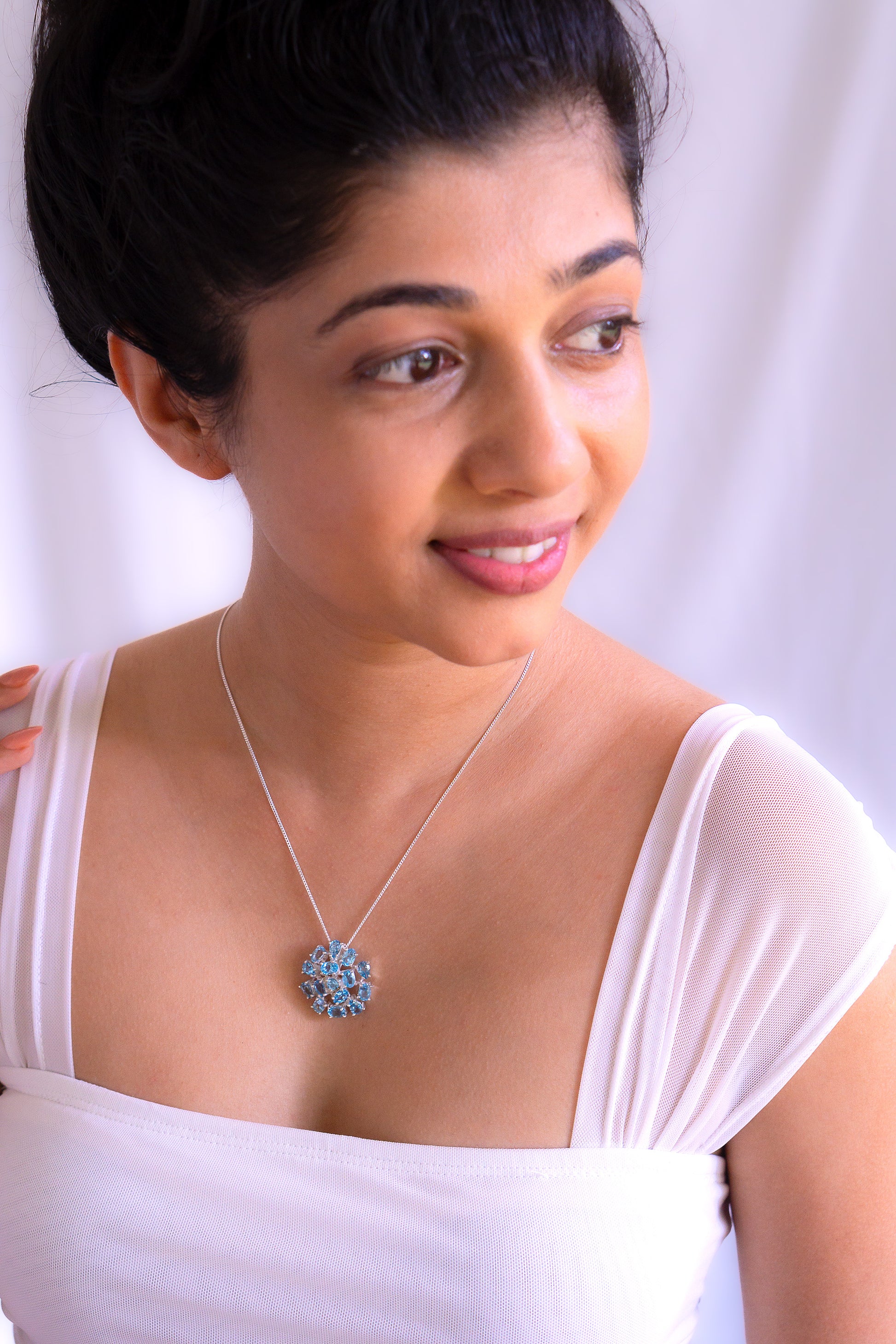 Sterling silver Leonore necklace with blue topaz gemstone by Cherie Lueur