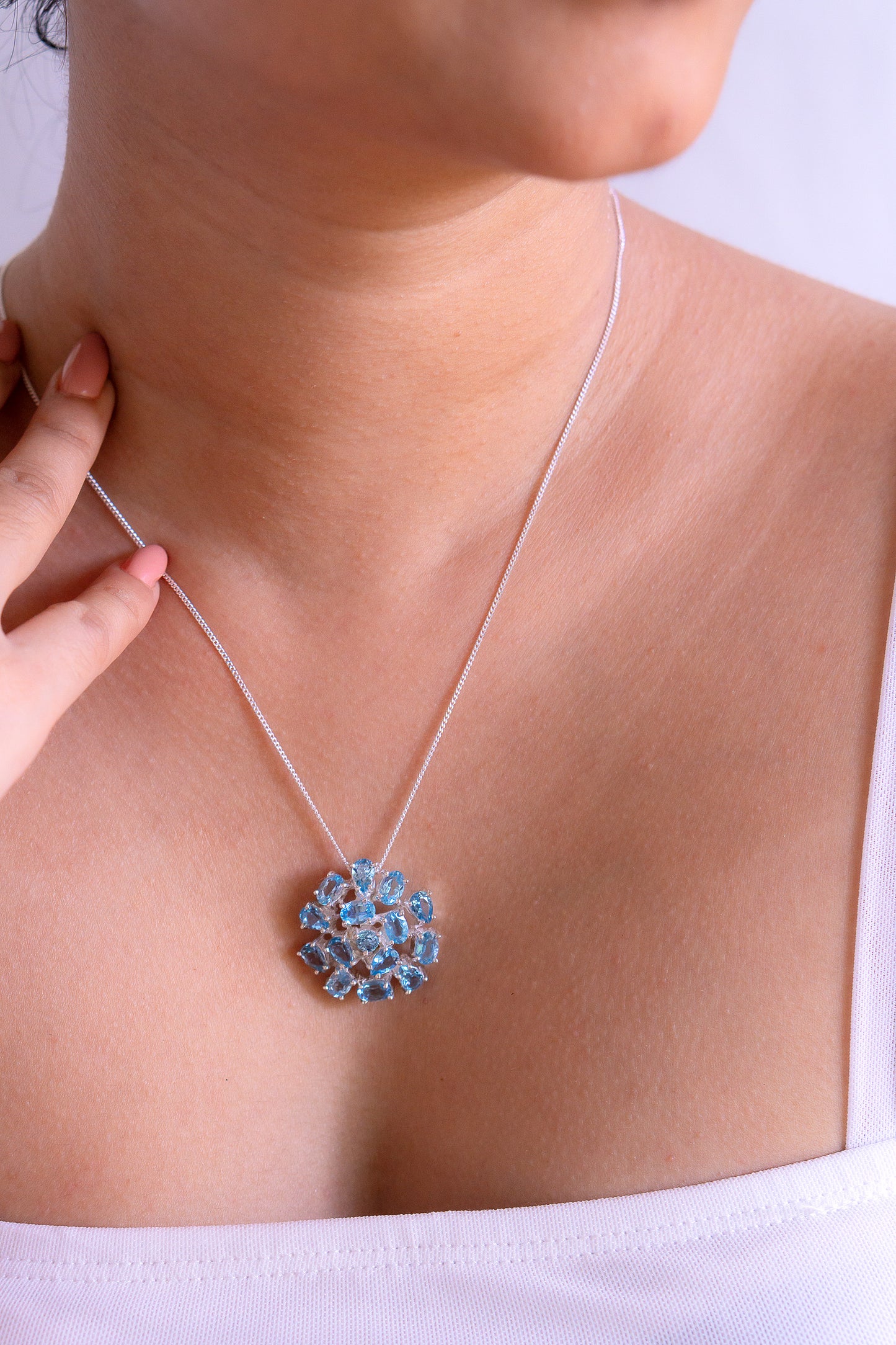 Sterling silver Leonore necklace with blue topaz gemstone by Cherie Lueur