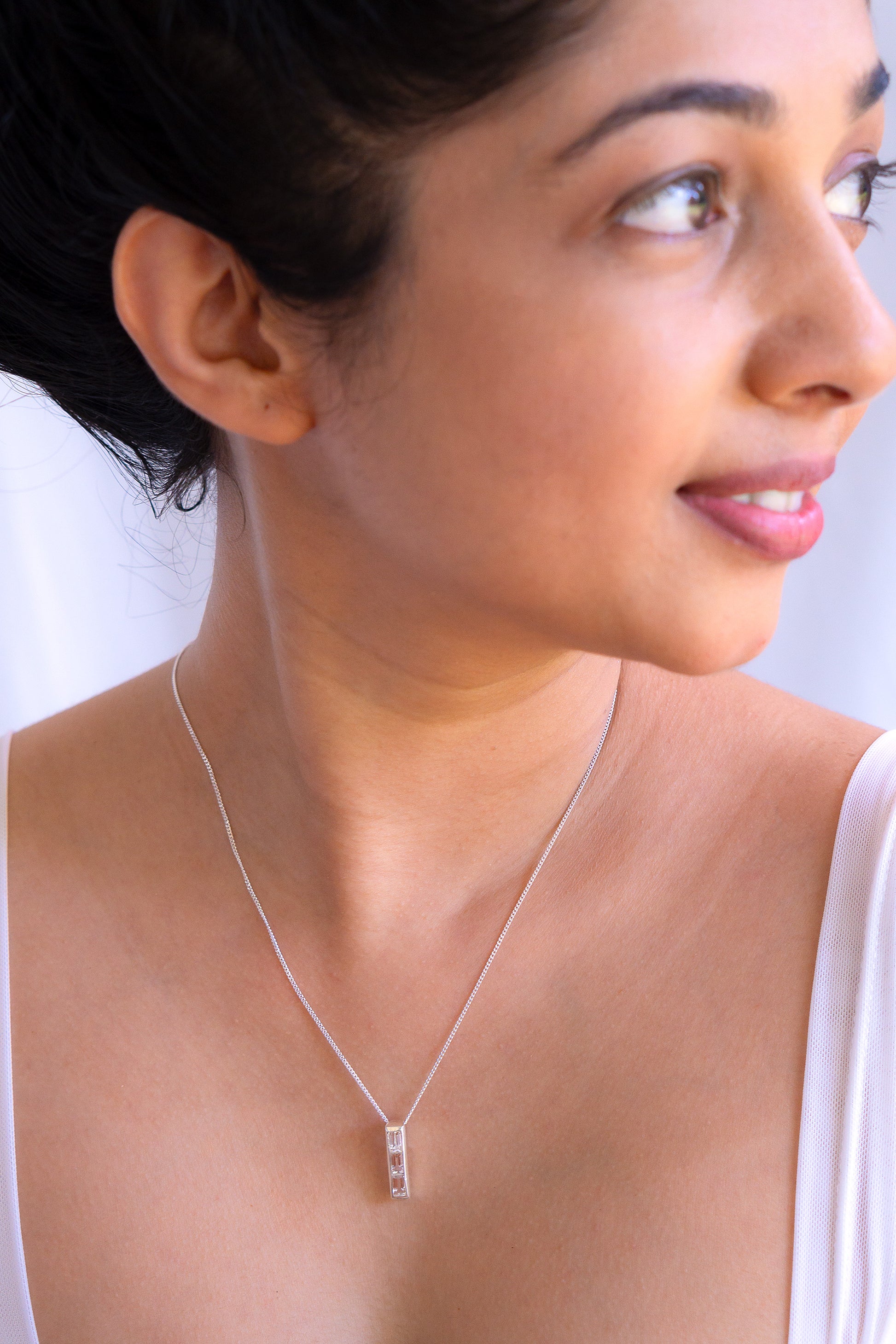 Sterling silver Arabella necklace with white topaz gemstone pendant by Cherie Lueur