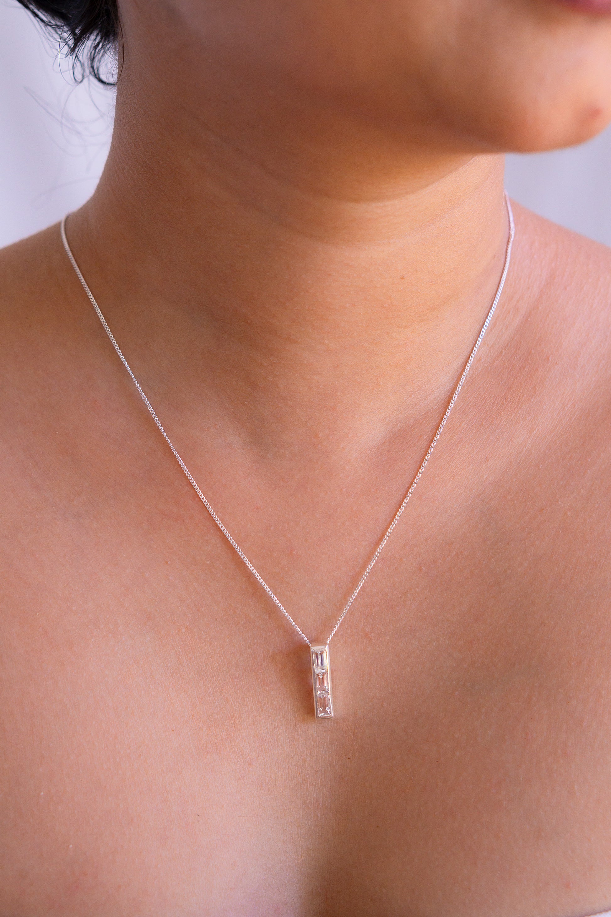 Sterling silver Arabella necklace with white topaz gemstone pendant by Cherie Lueur